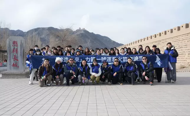 Students and teachers visit the Jiayuguan section of the Great Wall