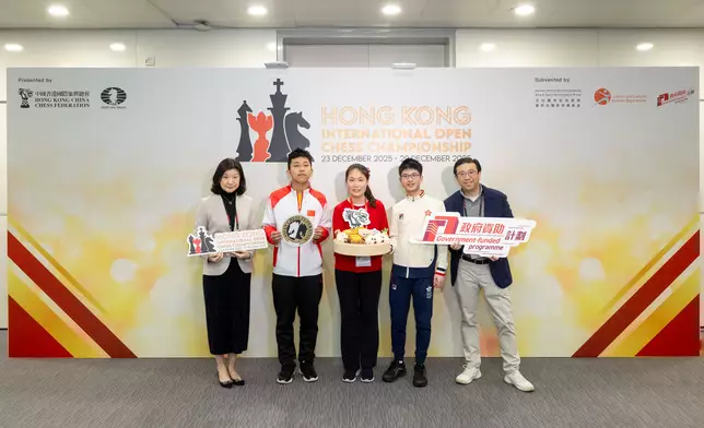 Group photo of Representatives of Hong Kong China Chess Federation with young players Second left: 14-year-old Chinese International Master (IM) Jiang Haochen Middle: 12-year-old Chinese Woman FIDE Master (WFM) Xue Tianhao Second Right: 16-year-old Hong Kong China representative for the 2022 Hangzhou Asian Games, Candidate Master (CM) Jamison Kao.