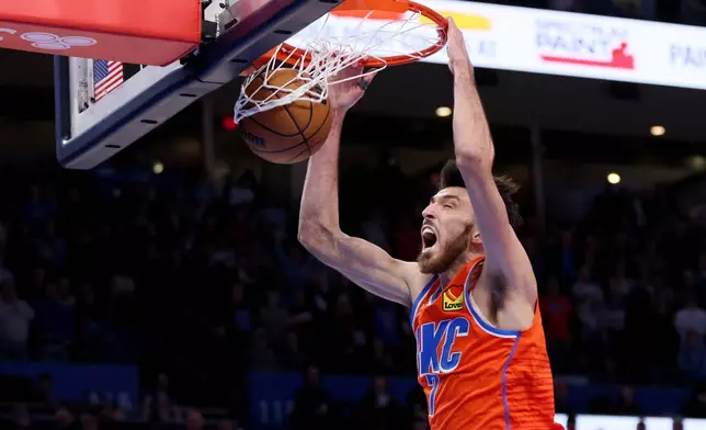 Oklahoma City Thunder center Chet Holmgren dunks during the second half of an NBA basketball game against the Atlanta Hawks, Monday, Dec. 29, 2025, in Oklahoma City. (AP Photo/Nate Billings)