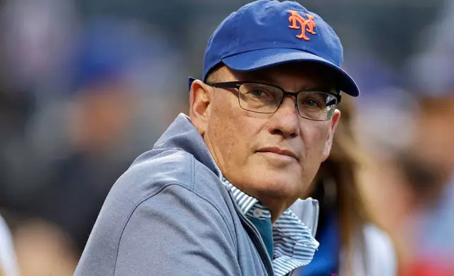FILE - New York Mets owner Steve Cohen waits for the team's baseball game against the Los Angeles Dodgers, Aug. 31, 2022, in New York. (AP Photo/Adam Hunger, File)