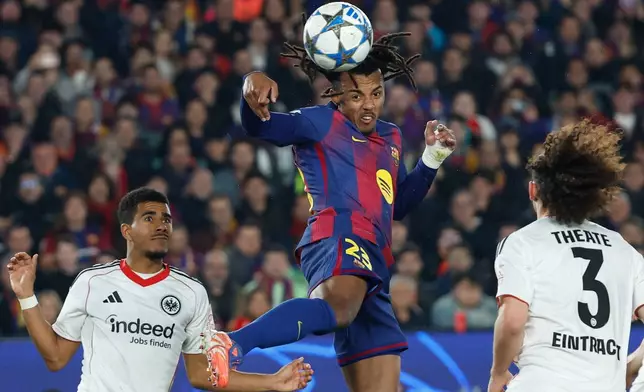 Barcelona's Jules Kounde scores his side's second goal during the Champions League opening phase soccer match between Barcelona and Eintracht Frankfurt in Barcelona, Spain, Tuesday, Dec. 9, 2025. (AP Photo/Joan Monfort)