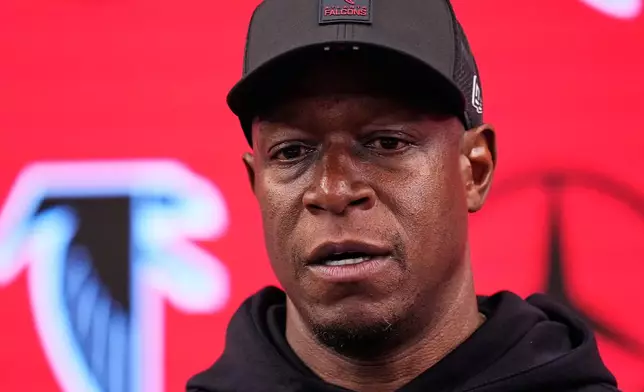 Atlanta Falcons head coach Raheem Morris talks to reporters after an NFL football game against the Los Angeles Rams, Monday, Dec. 29, 2025, in Atlanta. (AP Photo/Mike Stewart)