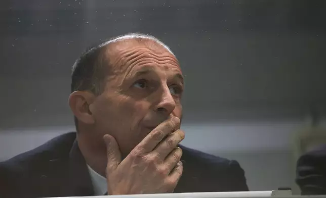 Milan's head coach Massimiliano Allegri watches the Serie A soccer match between Torino FC and Milan in Turin, Italy, Monday, Dec. 8, 2025. (Tano Pecoraro/LaPresse via AP)