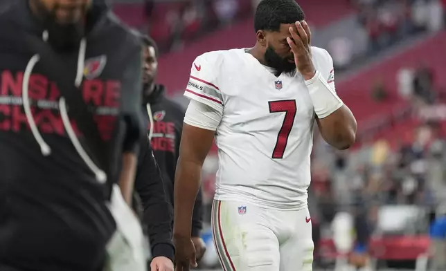 Arizona Cardinals quarterback Jacoby Brissett (7) leaves the field after an NFL football game against the Atlanta Falcons, Sunday, Dec. 21, 2025, in Glendale, Ariz. (AP Photo/Ross D. Franklin)