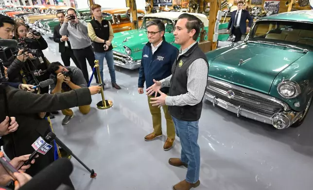 Republican U.S Congressional candidate for the seventh district Matt Van Epps addresses the media as he stands next to U.S. House Speaker Mike Johnson during a rally Monday, Dec. 1, 2025, in Franklin, Tenn. (AP Photo/John Amis)