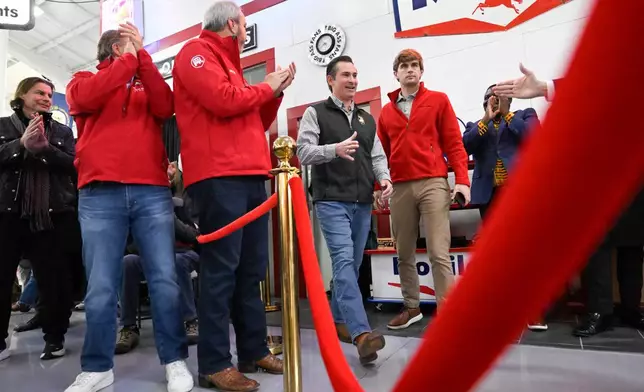 Republican U.S Congressional candidate for the seventh district Matt Van Epps goes to shake hands as he comes out to applause during a rally Monday, Dec. 1, 2025, in Franklin, Tenn. (AP Photo/John Amis)