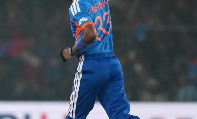 India's Hardik Pandya celebrates the wicket of South Africa's David Miller during the first T20 International cricket match between India and South Africa in Cuttack, India, Tuesday, Dec. 9, 2025. (AP Photo/Rafiq Maqbool)