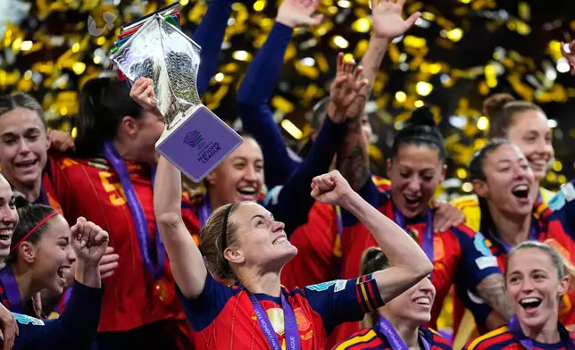 Spain's team captain Irene Paredes lifts the trophy after winning the Women's Nations League final soccer match between Spain and Germany in Madrid, Tuesday, Dec. 2, 2025. (AP Photo/Manu Fernandez)