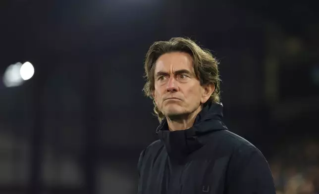 Tottenham's head coach Thomas Frank waits for the start of the English Premier League soccer match between Crystal Palace and Tottenham Hotspur in London, Sunday, Dec. 28, 2025. (AP Photo/Ian Walton)