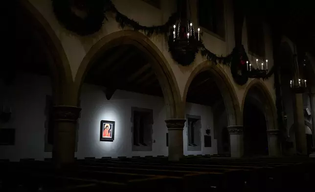 A painting hangs inside the All Saints Episcopal Church in Pasadena, Calif., on Monday, Dec. 15, 2025. (AP Photo/William Liang)