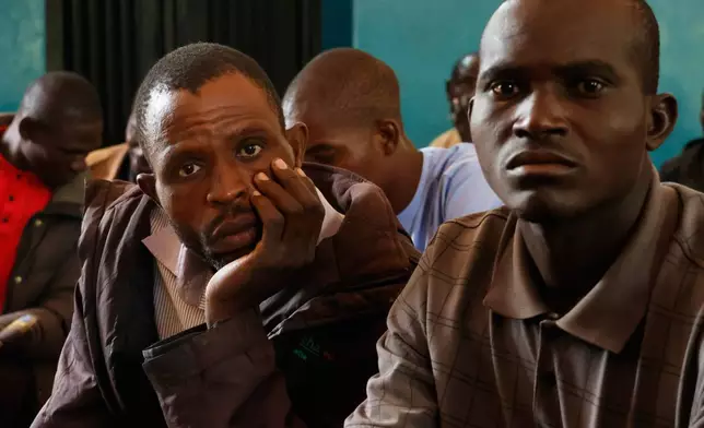 Worried parents of abducted school children gather at the St. Mary's Catholic Primary and Secondary School in Papiri community, Nigeria, Friday, Nov. 28, 2025. (AP Photo )