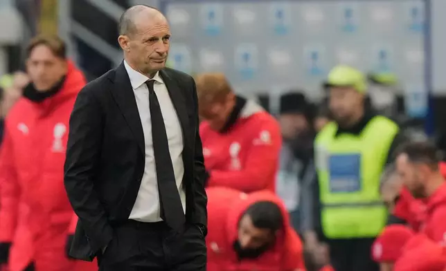 AC Milan's head coach Massimiliano Allegri leaves the field after the Serie A soccer match between AC Milan and Sassuolo, in Milan, Italy, Sunday, Dec. 14, 2025. (AP Photo/Luca Bruno)