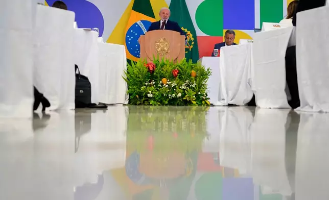 Brazilian President Luiz Inacio Lula da Silva speaks during a year-end press conference at Planalto presidential palace in Brasilia, Brazil, Thursday, Dec. 18, 2025. (AP Photo/Eraldo Peres)