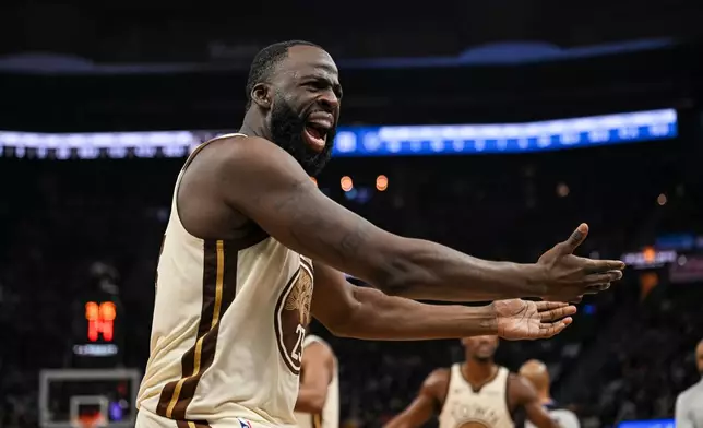 Golden State Warriors forward Draymond Green yells at the referee during the first half of an NBA basketball game against the Orlando Magic, Monday, Dec. 22, 2025, in San Francisco (AP Photo/Justine Willard)