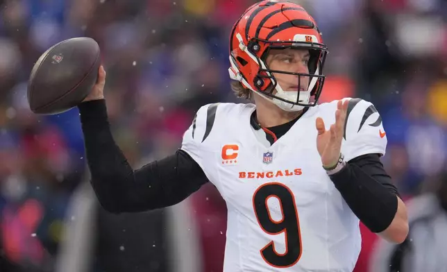 Cincinnati Bengals quarterback Joe Burrow throws a pass during the second half of an NFL football game against the Buffalo Bills, Sunday, Dec. 7, 2025, in Orchard Park, N.Y. (AP Photo/Gene J. Puskar)