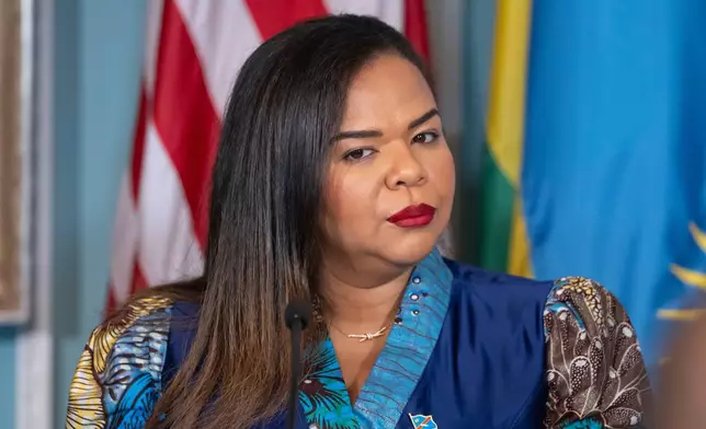 FILE - Democratic Republic of the Congo's Foreign Minister Therese Kayikwamba Wagner attends a signing ceremony for a peace agreement between Rwanda and the Democratic Republic of the Congo at the State Departmentin Washington, June 27, 2025. (AP Pho to/Mark Schiefelbein, File)