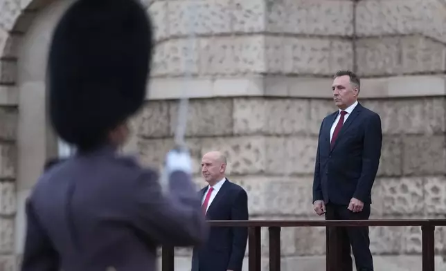 Norway's Minister of Defence Tore O. Sandvik, right, and Britain's Secretary of State for Defence John Healey inspect a guard of honour in Horse Guards Parade in London, Thursday, Dec. 4, 2025. (AP Photo/Alastair Grant, pool)