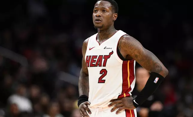 FILE - Miami Heat guard Terry Rozier (2) looks on during the second half of an NBA basketball game against the Washington Wizards, March 31, 2024, in Washington. (AP Photo/Nick Wass, File)