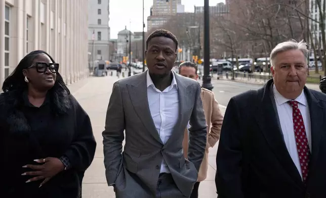 Miami Heat's Terry Rozier arrives at Brooklyn federal court, Monday, Dec. 8, 2025, in New York. (AP Photo/Yuki Iwamura)