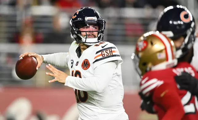 Chicago Bears quarterback Caleb Williams passes against the San Francisco 49ers during the second half of an NFL football game in Santa Clara, Calif., Sunday, Dec. 28, 2025. (AP Photo/Eakin Howard)