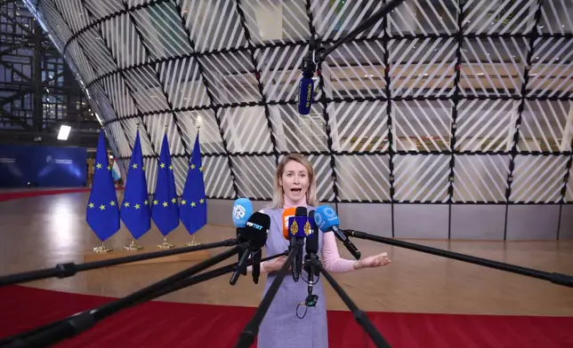 European Union foreign policy chief Kaja Kallas speaks with the media as she arrives for the EU Summit in Brussels, Thursday, Dec. 18, 2025. (AP Photo/Omar Havana)
