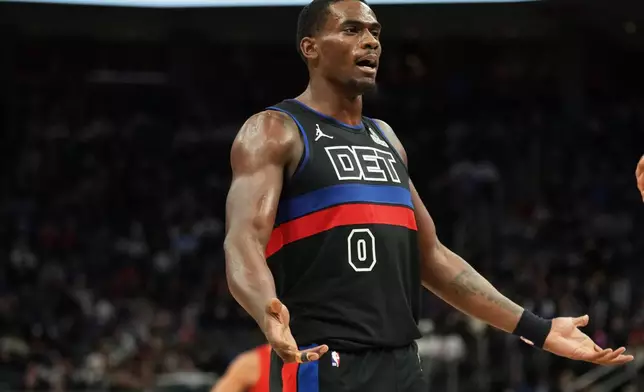Detroit Pistons center Jalen Duren reacts during the first half of an NBA basketball game against the Portland Trail Blazers, Friday, Dec. 5, 2025, in Detroit. (AP Photo/Ryan Sun)
