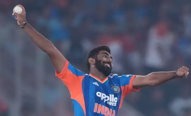 India's Jasprit Bumrah bowls a delivery during the fifth T20 cricket match between India and South Africa in Ahmedabad, India, Friday, Dec. 19, 2025. (AP Photo/Ajit Solanki)