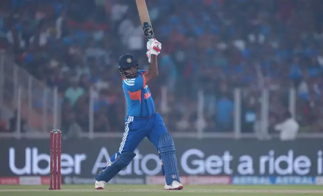 India's Sanju Samson plays a shot during the fifth T20 cricket match between India and South Africa in Ahmedabad, India, Friday, Dec. 19, 2025. (AP Photo/Ajit Solanki)