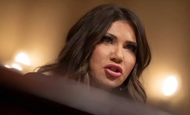 Homeland Security Secretary Kristi Noem appears before the House Committee on Homeland Security on Capitol Hill in Washington, Thursday, Dec. 11, 2025. (AP Photo/Mark Schiefelbein)