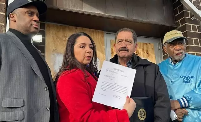 Four Illinois members of Congress left to right; Rep. Jonathan Jackson, D-Ill., Rep. Delia Ramirez, D-Ill., Jesus Garcia, D-Ill., and Rep. Danny Davis, D-Ill., are allowed to enter the U.S. Immigration and Customs Enforcement processing center Monday, Dec. 22, 2025, in Broadview, Ill. (AP Photo/Sophia Tareen)