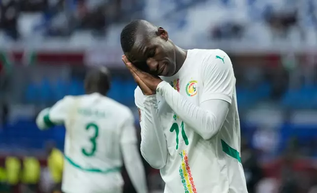Senegal's Nicolas Jackson celebrates after scoring during the Africa Cup of Nations group D soccer match between Senegal and Botswana in Tangier, Morocco, Tuesday, Dec. 23, 2025. (AP Photo/Mosa'ab Elshamy)
