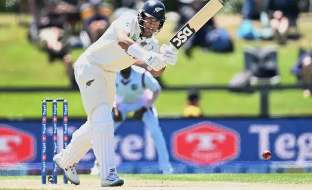 New Zealand's Rachin Ravindra bats against the West Indies on day 3 during their cricket test match in Christchurch, New Zealand, Thursday, Dec. 4, 2025. (Andrew Cornaga/Photosport via AP)