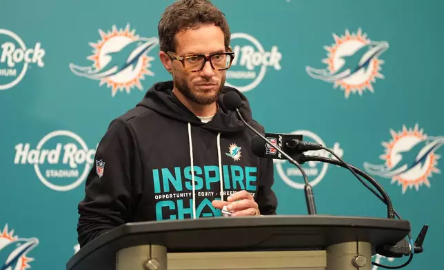 Miami Dolphins head coach Mike McDaniel speaks during a news conference after an NFL football game against the Tampa Bay Buccaneers, Sunday, Dec. 28, 2025, in Miami Gardens, Fla. (AP Photo/Rebecca Blackwell)