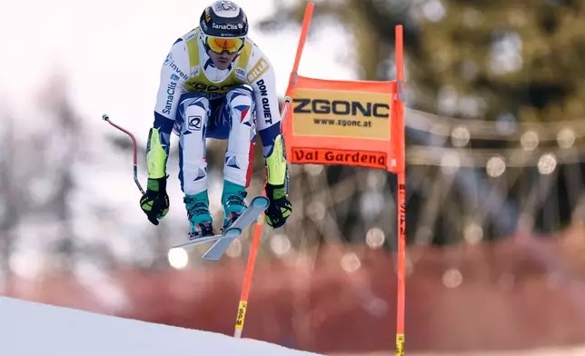 Czech Republic's Jan Zabystran speeds down the course during an alpine ski, men's World Cup super-G, in Val Gardena, France, Friday, Dec.19, 2025. (AP Photo/Gabriele Facciotti)