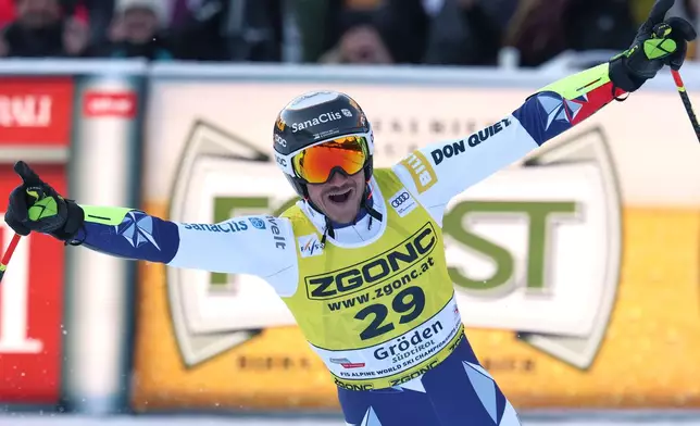 Czech Republic's Jan Zabystran reacts after completing an alpine ski, men's World Cup super-G, in Val Gardena, France, Friday, Dec.19, 2025 (AP Photo/Alessandro Trovati)