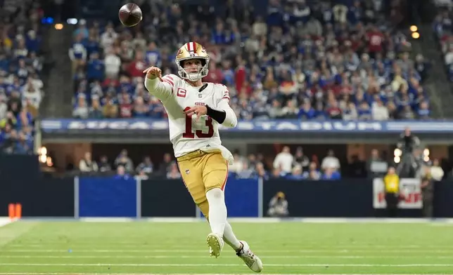 San Francisco 49ers quarterback Brock Purdy (13) passes against the Indianapolis Colts during the second half of an NFL football game, Monday, Dec. 22, 2025, in Indianapolis. (AP Photo/Carolyn Kaster)