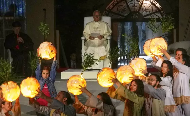 Pope Leo XIV arrives for a meeting with young people in the Square in front of the Maronite Patriarchate of Antioch in Bkerki, Lebanon, Monday, Dec. 1, 2025. (AP Photo/Domenico Stinellis)