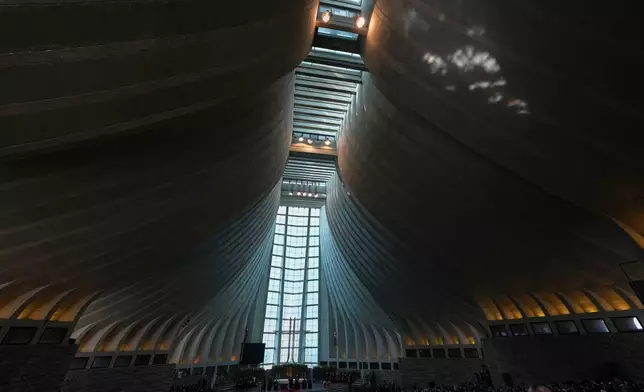 Pope Leo XIV meets with bishops, priests, consecrated people and pastoral workers at the Shrine of Our Lady of Lebanon in Harissa, Lebanon, Monday, Dec. 1, 2025. (AP Photo/Domenico Stinellis)