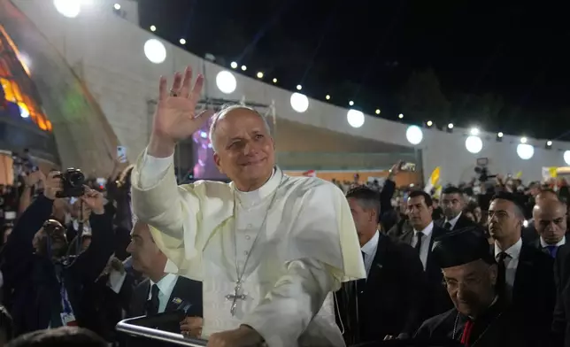 Pope Leo XIV arrives for a meeting with young people in the Square in front of the Maronite Patriarchate of Antioch in Bkerke, Lebanon, Monday, Dec. 1, 2025. (AP Photo/Domenico Stinellis)