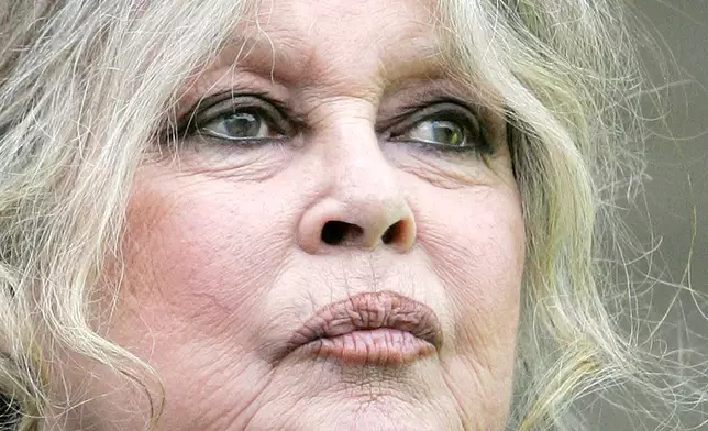 FILE - French film legend and animal rights activist Brigitte Bardot looks on prior to a march of various animal rights associations on March 24, 2007 in Paris. (AP Photo/Jacques Brinon, file)