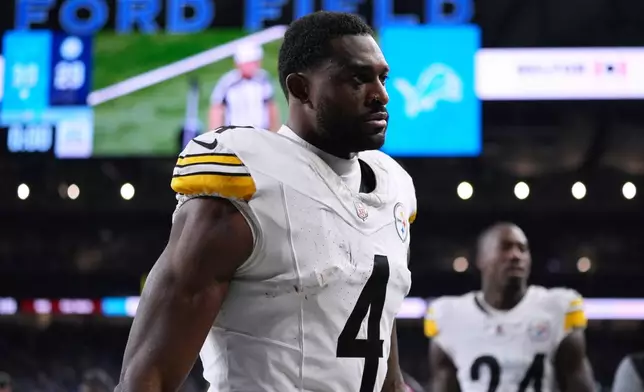 Pittsburgh Steelers' DK Metcalf walks off the field after an NFL football game against the Detroit Lions, Sunday, Dec. 21, 2025, in Detroit. (AP Photo/Ryan Sun)