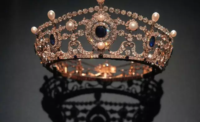 Tiara of Winifred Dallas-Yorke, Duchess of Portland, crafted by Garrard, London, 1889, sapphires, diamonds and pearls set in gold and silver, is displayed at the exhibition "Dynastic Jewels" organized by The Al Thani Collection Foundation at the Hôtel de la Marine museum in Paris, France, Monday, Dec. 8, 2025. (AP Photo/Michel Euler)