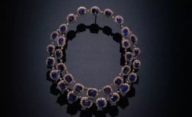 A Necklace crafted in England, 1850, sapphires, diamonds, gold and silver is displayed at the exhibition "Dynastic Jewels" organized by The Al Thani Collection at the Hôtel de la Marine museum in Paris, France, Monday, Dec. 8, 2025. (AP Photo/Michel Euler)
