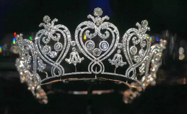 The Manchester Tiara, crafted by Cartier, Paris, 1993; diamonds, glass paste, gold and silver is displayed at the exhibition "Dynastic Jewels" organized by The Al Thani Collection Foundation at the Hôtel de la Marine museum in Paris, France, Monday, Dec. 8, 2025. (AP Photo/Michel Euler)