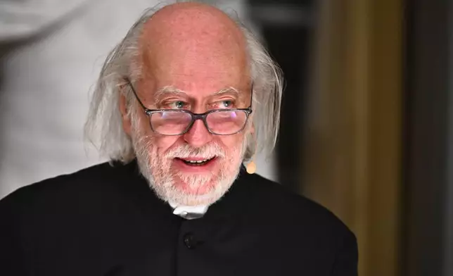 Laszlo Krasznahorkai, Nobel Prize laureate in Literature, delivers his Nobel Prize lecture in Stockholm, Sweden, Sunday Dec. 7, 2025. (Claudio Bresciani/TT News Agency via AP)