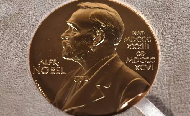 FILE - The Nobel medal in physiology or medicine presented to Charles M. Rice is displayed, Tuesday, Dec. 8, 2020, during a ceremony in New York. (Angela Weiss/Pool Photo via AP, File)
