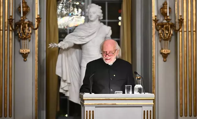 Laszlo Krasznahorkai, Nobel Prize laureate in Literature, delivers his Nobel Prize lecture in Stockholm, Sweden, Sunday Dec. 7, 2025. (Claudio Bresciani/TT News Agency via AP)