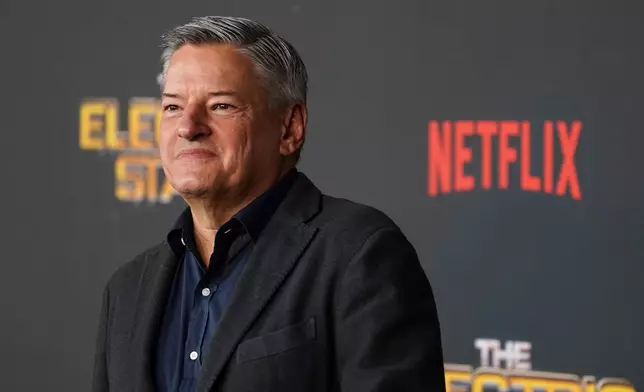 FILE - Ted Sarandos arrives at the premiere of "The Electric State" on Monday, Feb. 24, 2025, at The Egyptian Theatre in Los Angeles. (Photo by Jordan Strauss/Invision/AP, File)