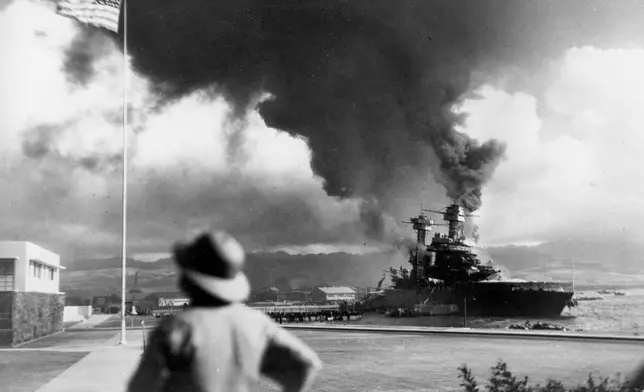 FILE - American ships burn during the Japanese attack on Pearl Harbor, Hawaii, Dec. 7, 1941. (AP Photo, File)