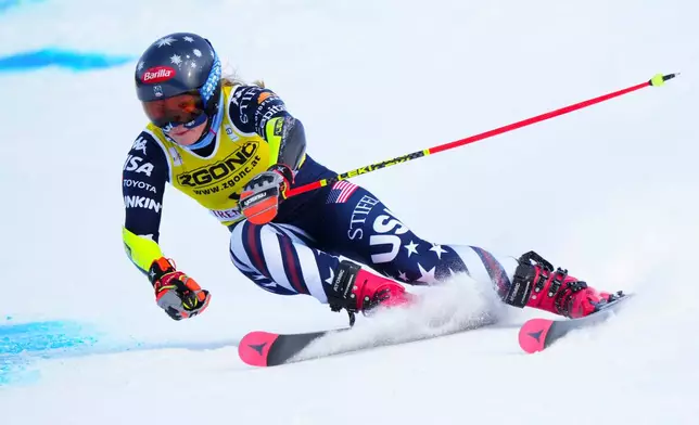 Mikaela Shiffrin, of United States, speeds down the course as she races in the women's World Cup giant slalom in Mont Tremblant, Que., Sunday, Dec. 7, 2025. (Sean Kilpatrick /The Canadian Press via AP)